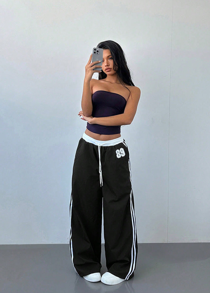 Pantalon de survêtement femme – Jambes larges rayées sur le côté | Poches