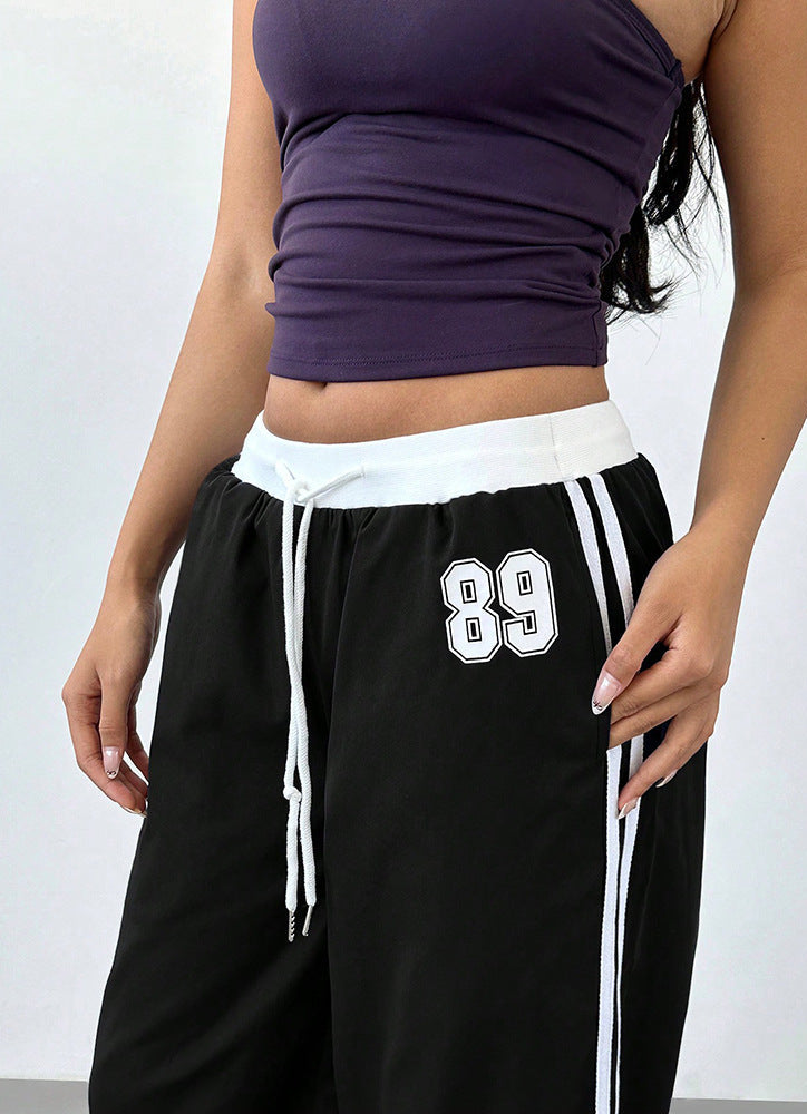 Pantalon de survêtement femme – Jambes larges rayées sur le côté | Poches