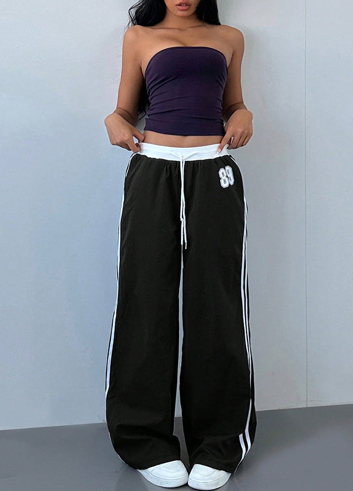Pantalon de survêtement femme – Jambes larges rayées sur le côté | Poches